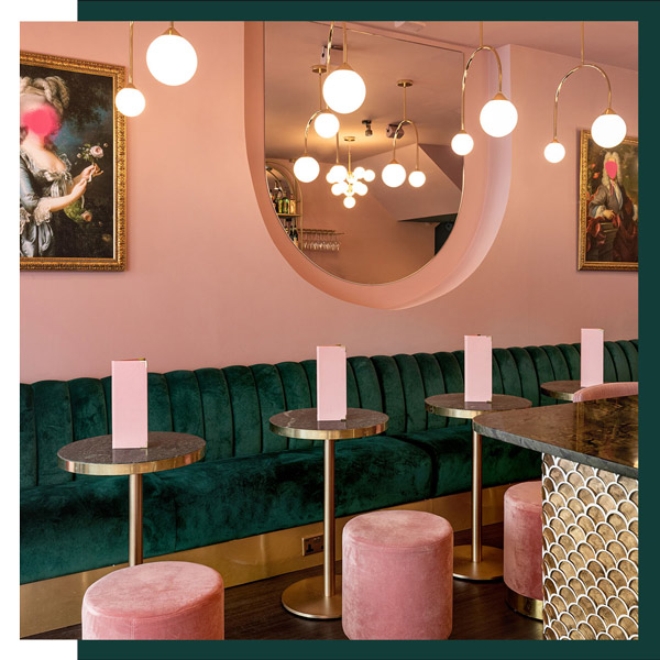 inside R Place Cocktail bar in Clapham, pink and green velvet interior with retro accessories